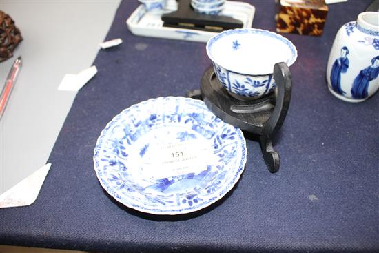 A Chinese blue and white tea bowl and saucer and two jars, Kangxi, some damage, largest diameter 11cm